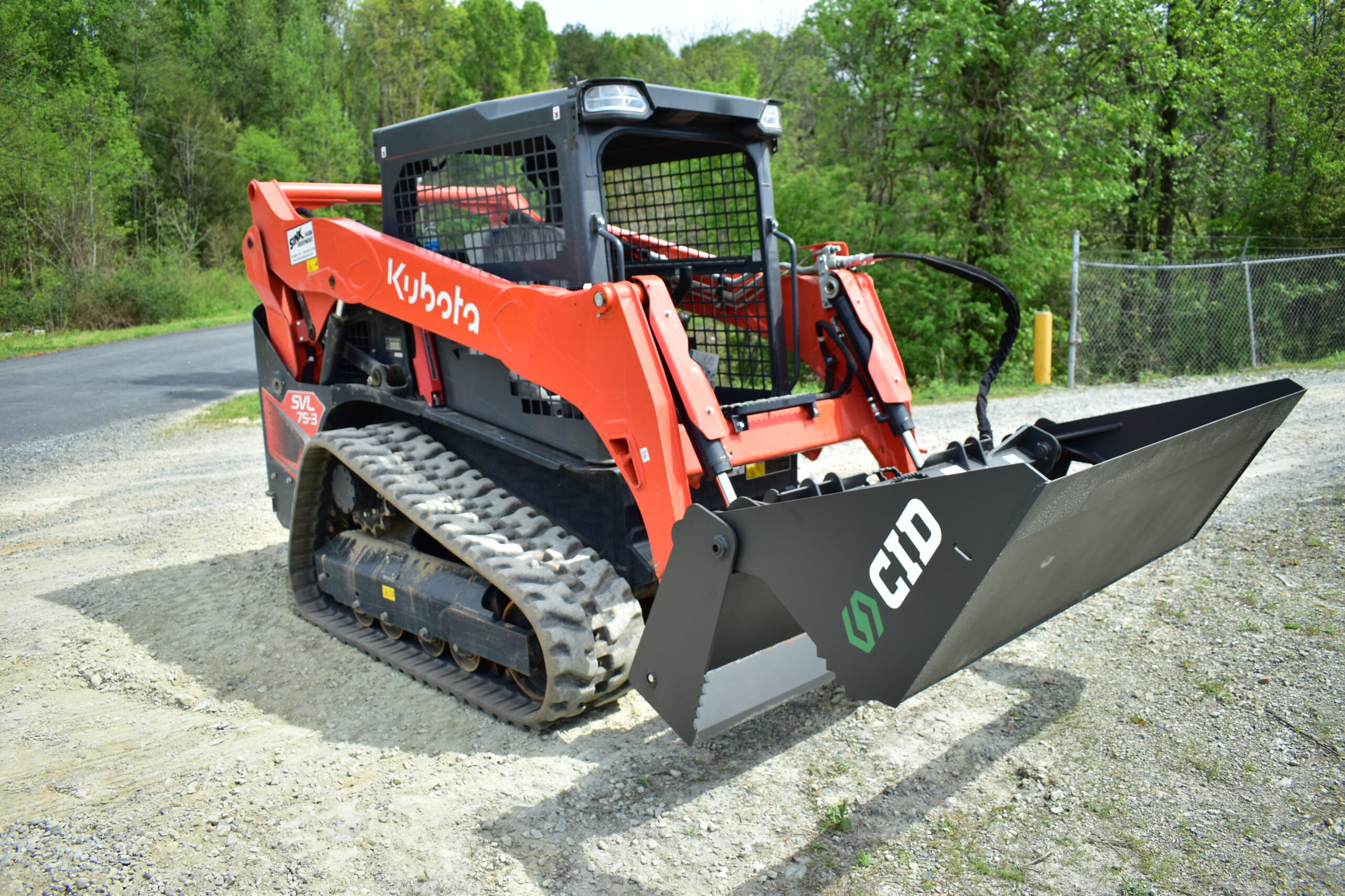 Commercial and government skid steer and excavator attachments from CID, including swing boom brush cutters, grapples, buckets, and severe duty vegetation management equipment for municipal, DOT, forestry, and commercial fleet operations.